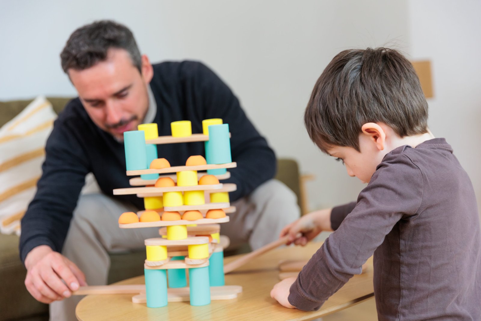 wooden planks and silicone connectors forming a tall bridge